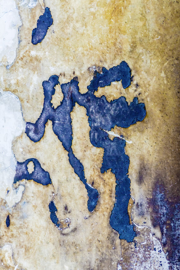 Fotomotiv welches an abstrakte Fotografie erinnert, Bildtitel: Eiskunstläufer