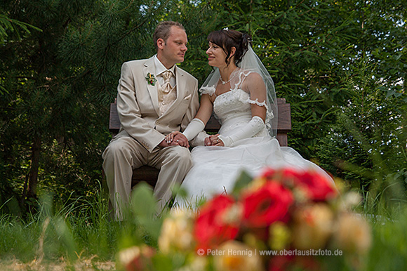 Foto Hochzeit Brautpaar mit Brautstrauß